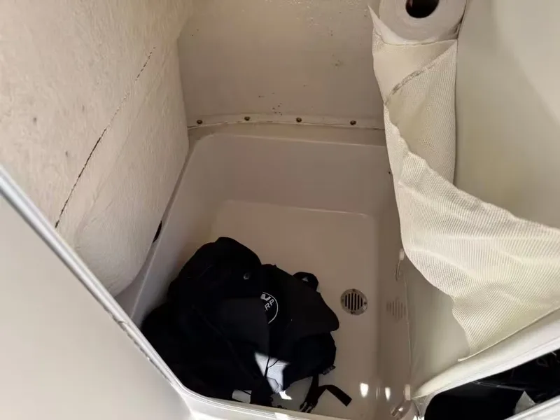 Slide: The Image of Storage compartment in Key West 230 Bay Reef boat, 2018 model. - 14