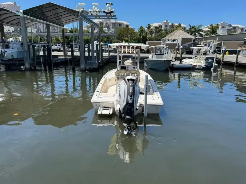 Slide: The Image of 2018 Key West 230 Bay Reef boat docked in marina. - 5