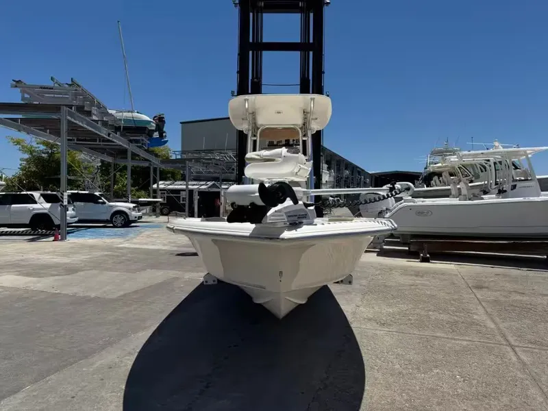 Slide: The Image of 2018 Key West 230 Bay Reef boat on a dock. - 8