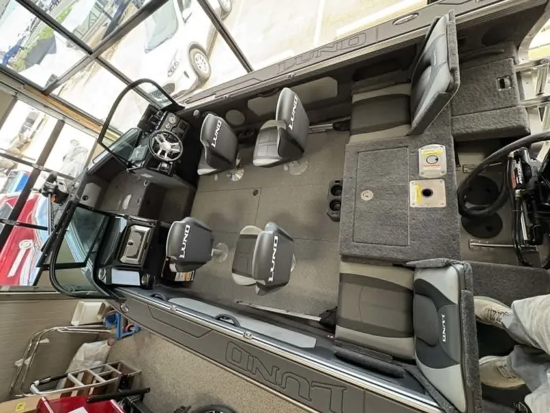 Slide: The Image of Interior view of the 2026 Lund 1875 Tyee Sport boat. - 3