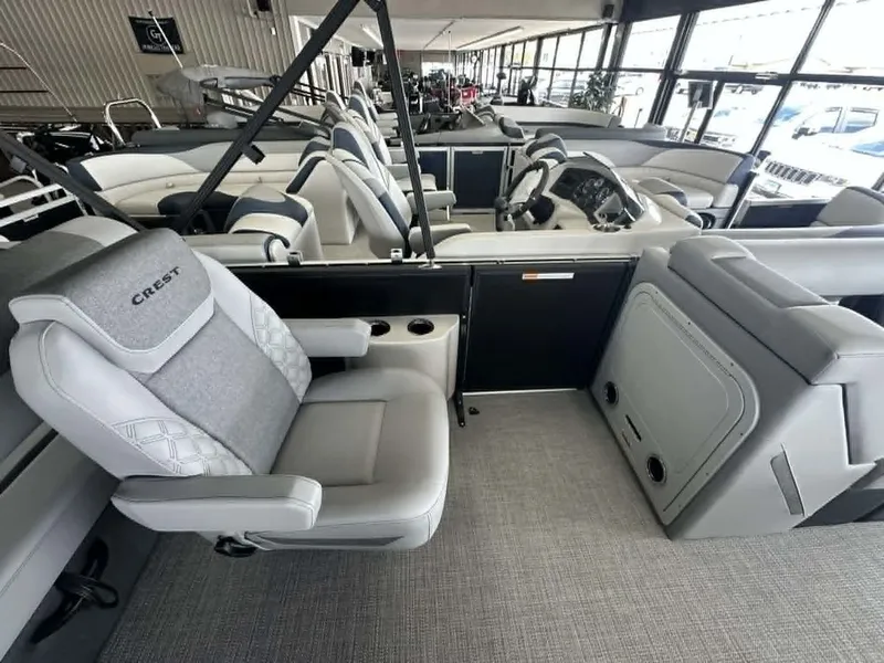 Slide: The Image of Interior of the 2026 Crest Conquest 23 FT pontoon boat. - 11