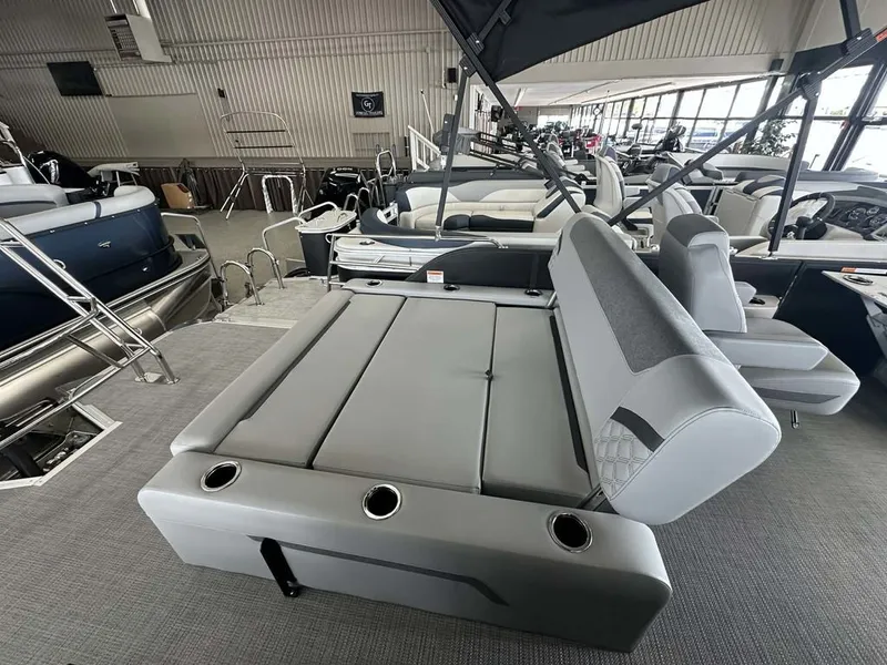 Slide: The Image of Interior of Crest Conquest 23 FT 2026 with gray seating. - 14