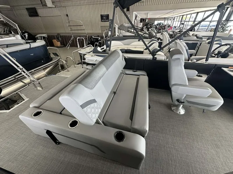 Slide: The Image of Interior of Crest Conquest 23 FT 2026 with gray seating. - 15