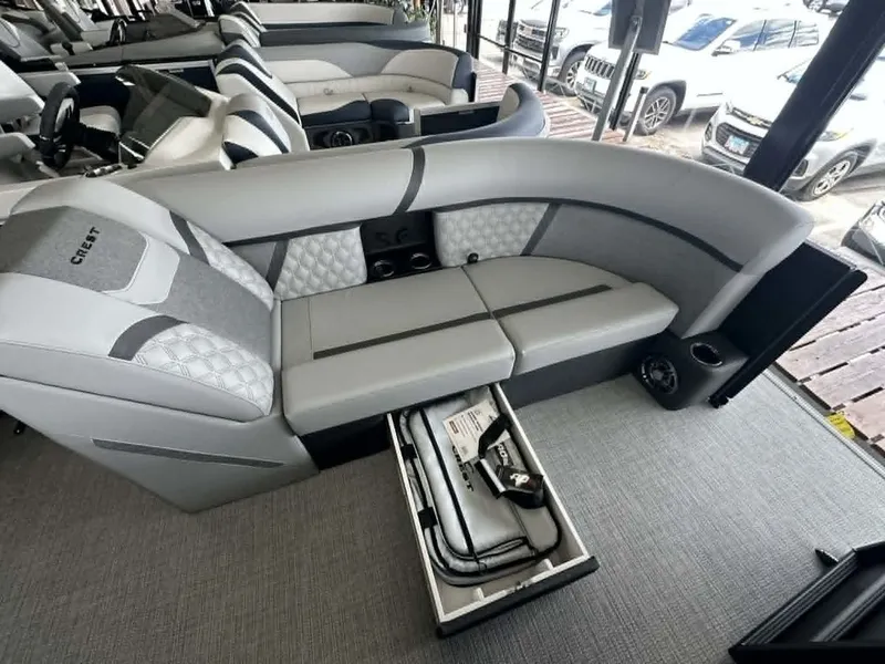 Slide: The Image of Interior of 2026 Crest Conquest 23 FT with under-seat storage. - 4