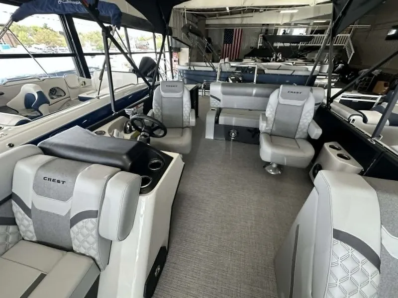 Slide: The Image of Interior of 2026 Crest Conquest 23 FT with luxurious seating. - 6