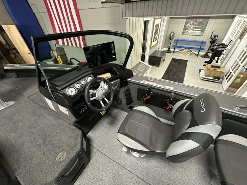 Slide: The Image of Interior of 2026 Lund 2075 Pro-V Sport with console and seating. - 8