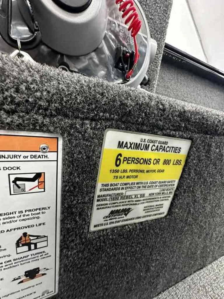 Slide: The Image of Lund 1650 Rebel XL SS 2026 boat capacity label, 6 persons or 800 lbs. - 8