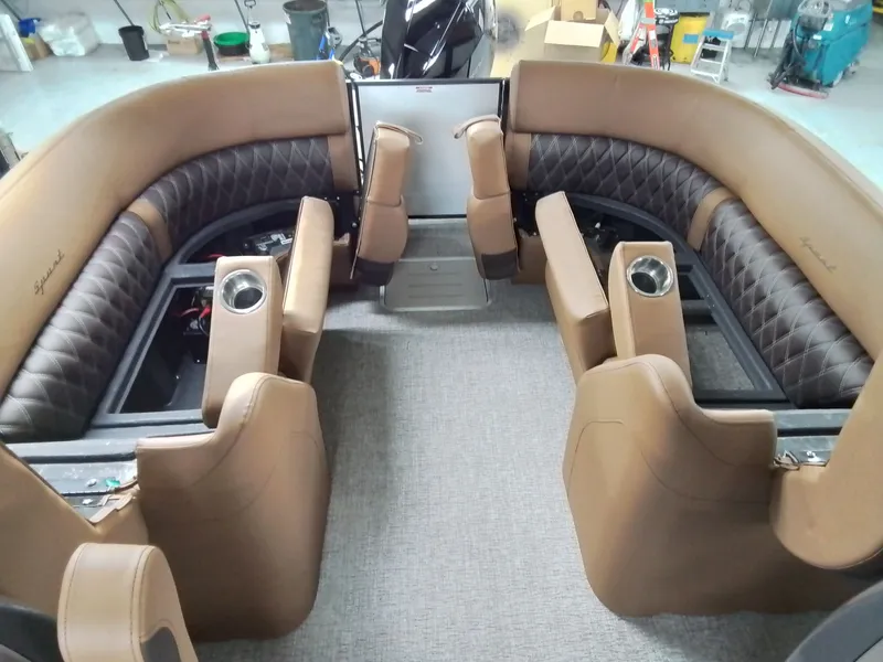 Slide: The Image of Interior of 2026 Bennington 25RSRSF with luxurious leather seating. - 17