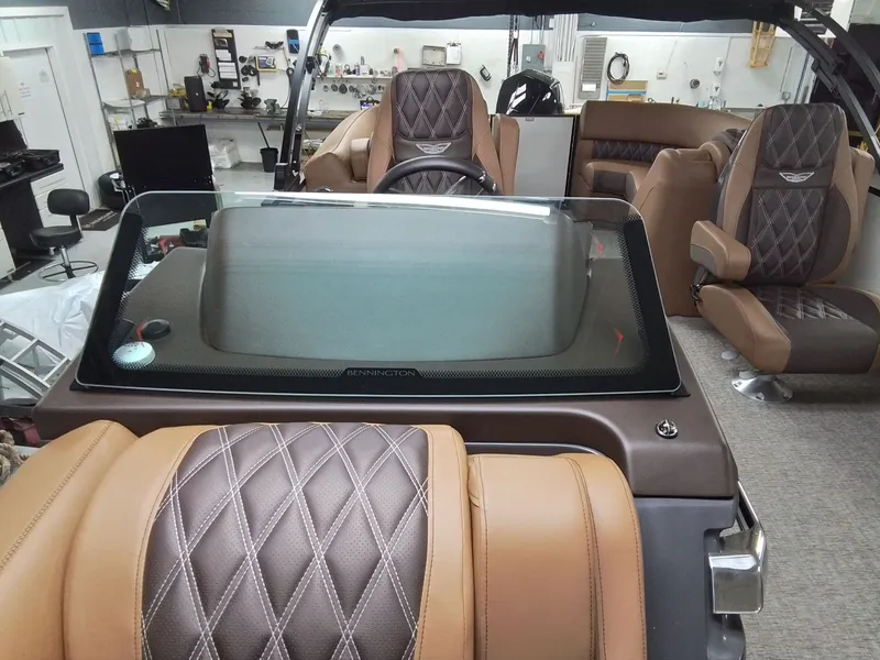 Slide: The Image of Interior of a 2026 Bennington 25RSRSF boat with luxurious seating. - 18