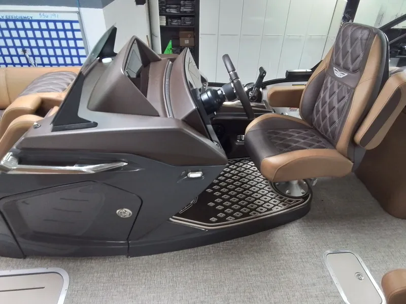 Slide: The Image of Interior of 2026 Bennington 25RSRSF with luxurious seating design. - 19