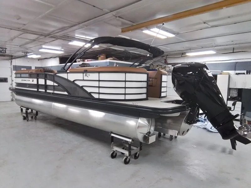 Slide: The Image of Bennington 25RSRSF 2026 pontoon boat in warehouse. - 4