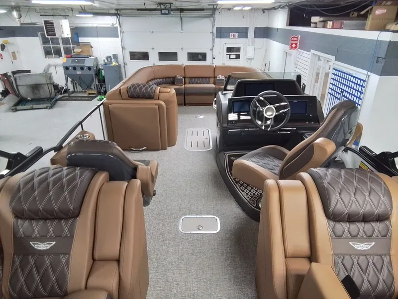 Slide: The Image of Interior of 2026 Bennington 25RSRSF with luxurious seating. - 7
