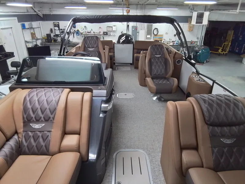 Slide: The Image of Interior of 2026 Bennington 25RSRSF with luxurious seating. - 9