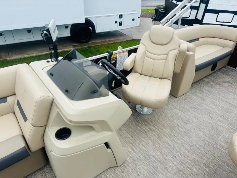 Slide: The Image of Interior of a 2024 Godfrey Pontoons 2286 SB with beige seating. - 10