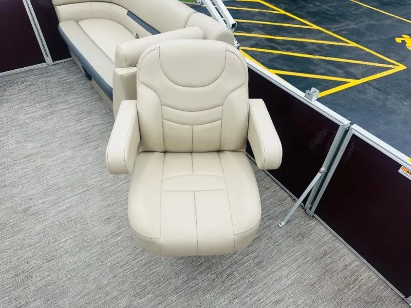 Slide: The Image of 2024 Godfrey Pontoons 2286 SB beige seat on boat. - 12