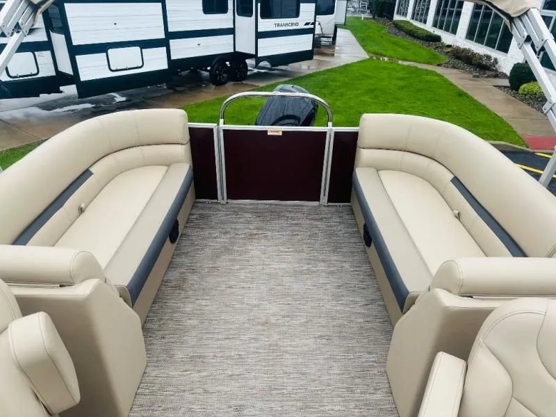 Slide: The Image of Interior of 2024 Godfrey Pontoons 2286 SB with beige seating. - 13