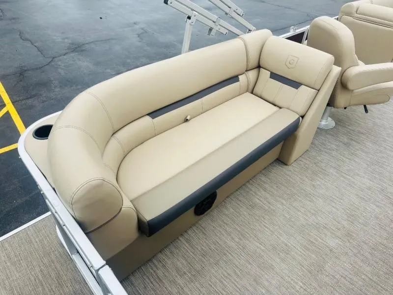 Slide: The Image of 2024 Godfrey Pontoons 2286 SB beige seating on boat. - 14