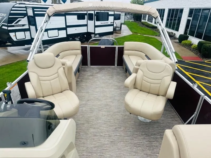 Slide: The Image of Interior of 2024 Godfrey Pontoons 2286 SB with beige seating. - 9