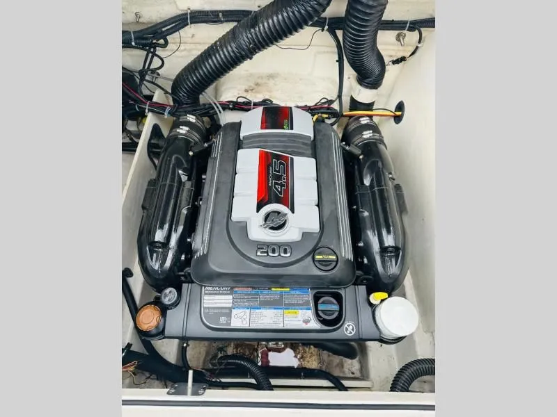 Slide: The Image of Engine compartment of a 2018 Bayliner VR5 boat with 4.5L 200 HP engine. - 4