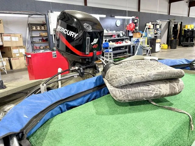 Slide: The Image of 2006 Tracker 1654CC boat with Mercury 40 HP motor in workshop. - 15