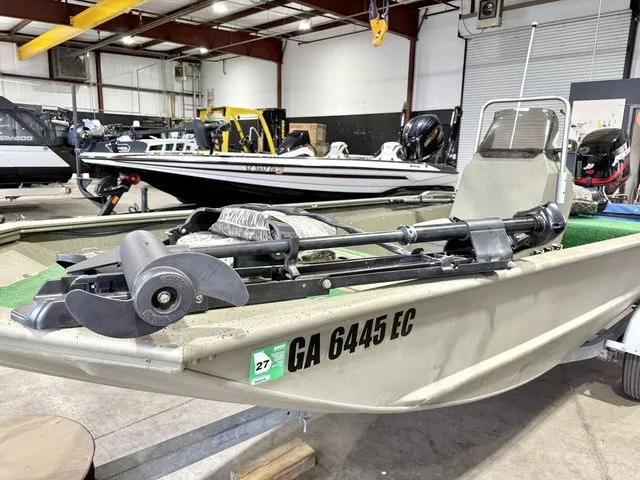 Slide: The Image of 2006 Tracker 1654CC boat in warehouse, front view. - 6