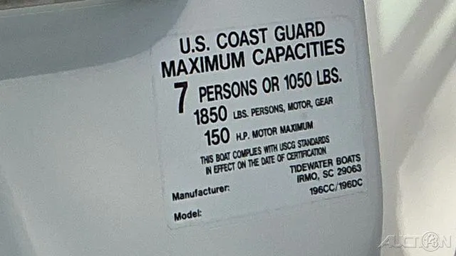 Slide: The Image of Tidewater 196DC Explorer 2014 boat capacity label, max 7 persons or 1050 lbs. - 12