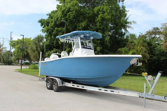 The Image of 2026 Sea Pro 245 FLXR Sandbar boat on trailer, blue. - 1