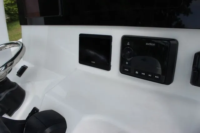 Slide: The Image of Dashboard of 2026 Sea Pro 245 FLXR Sandbar with audio system. - 17