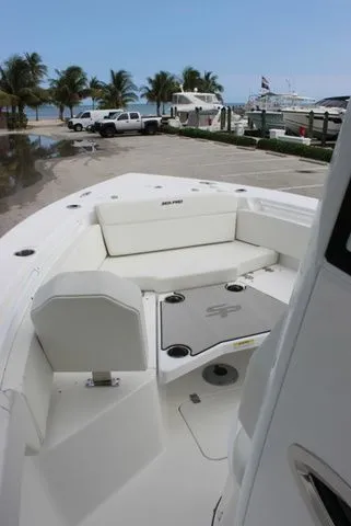 Slide: The Image of 2026 Sea Pro 245 FLXR Sandbar boat at the beach. - 19