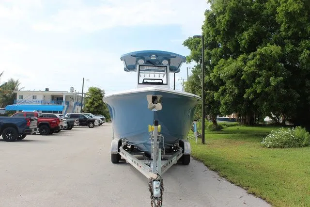 Slide: The Image of 2026 Sea Pro 245 FLXR Sandbar boat parked on trailer. - 2