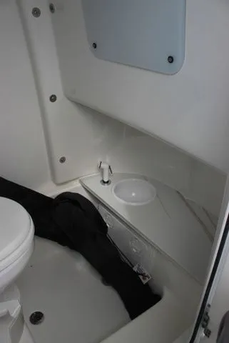 Slide: The Image of Interior of Sea Pro 245 FLXR Sandbar 2026 with toilet. - 27