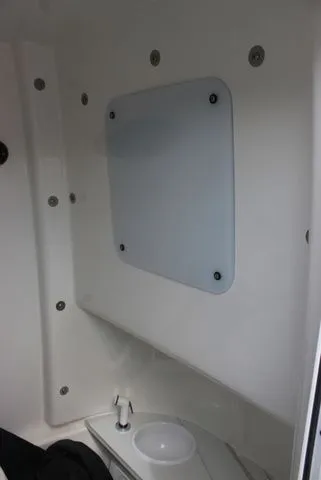 Slide: The Image of Interior of Sea Pro 245 FLXR Sandbar 2026 with toilet. - 28