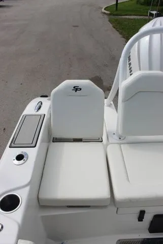 Slide: The Image of 2026 Sea Pro 245 FLXR Sandbar boat, white seats, port view. - 30