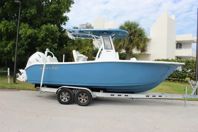 Slide: The Image of 2026 Sea Pro 245 FLXR Sandbar boat on trailer, blue. - 4