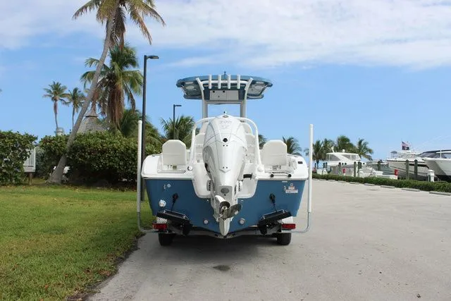 Slide: The Image of Rear view of 2026 Sea Pro 245 FLXR Sandbar boat at dock. - 6