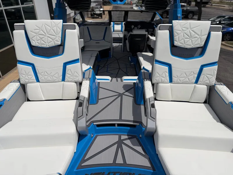 Slide: The Image of Interior of 2026 Nautique Super Air Nautique G25 Paragon with luxurious seating. - 12