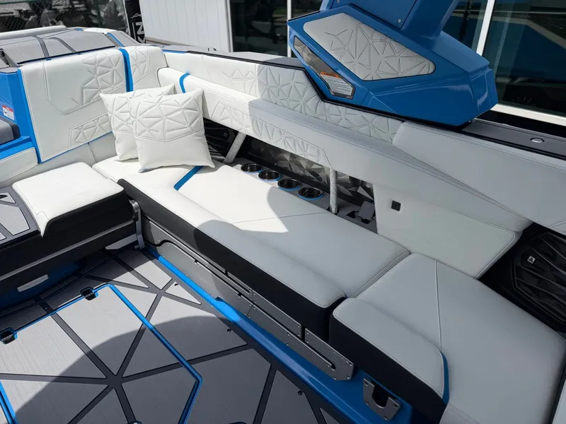 Slide: The Image of Interior of 2026 Nautique Super Air Nautique G25 Paragon with luxurious seating. - 19
