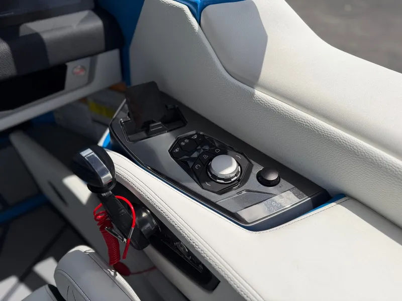Slide: The Image of Interior controls of the 2026 Nautique Super Air Nautique G25 Paragon. - 24
