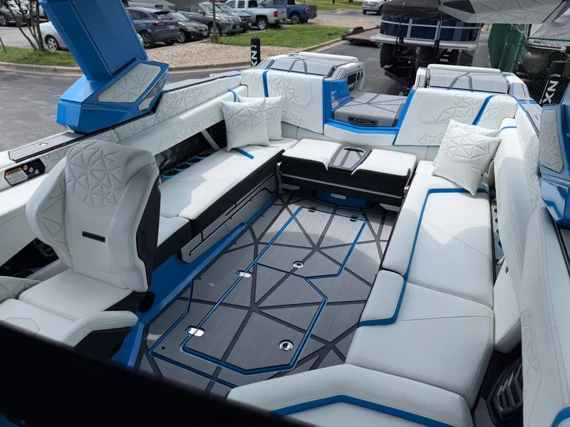 Slide: The Image of Interior of 2026 Nautique Super Air Nautique G25 Paragon with luxurious seating. - 31