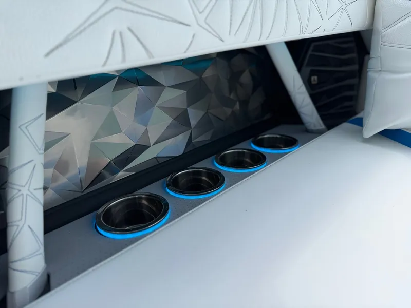 Slide: The Image of Interior of 2026 Nautique Super Air Nautique G25 Paragon with illuminated cup holders. - 40
