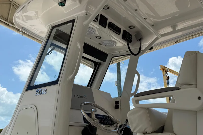 Slide: The Image of Interior view of 2017 Everglades 255 Center Console boat with Garmin navigation system. - 10