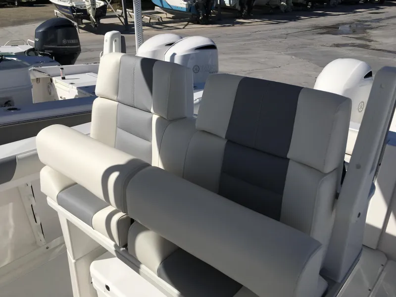 Slide: The Image of 2017 Everglades 255 Center Console with cushioned seats. - 11