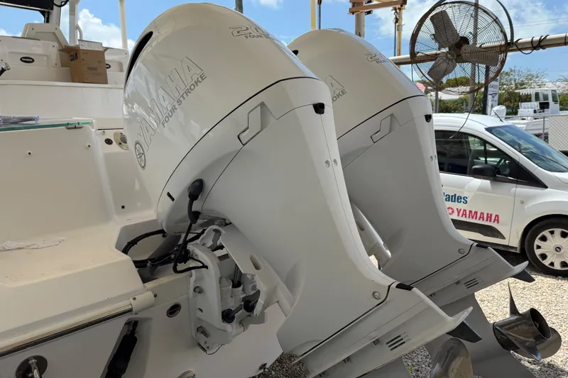Slide: The Image of Twin Yamaha outboard engines on a 2017 Everglades 255 Center Console boat. - 14