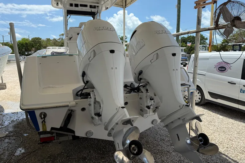 Slide: The Image of 2017 Everglades 255 Center Console with twin Yamaha 200 outboard engines. - 15