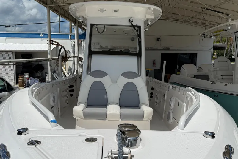 Slide: The Image of 2017 Everglades 255 Center Console boat interior with seating and controls. - 7