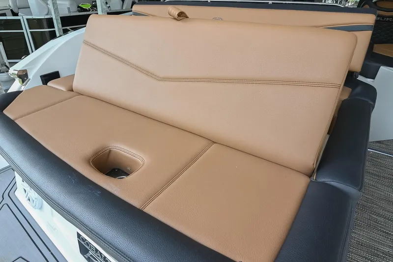 Slide: The Image of Luxury tan and black seating on 2022 Cobalt R6 Surf boat. - 11