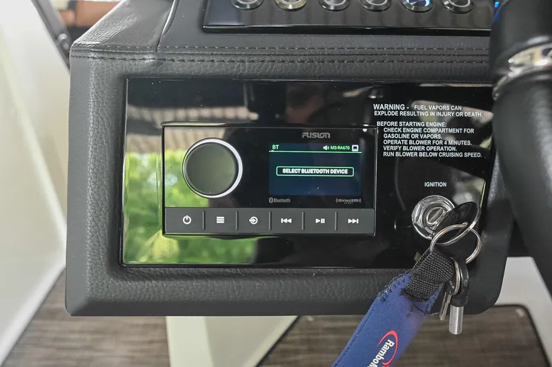 Slide: The Image of 2022 Cobalt R6 Surf dashboard with Fusion audio system and ignition keys. - 28