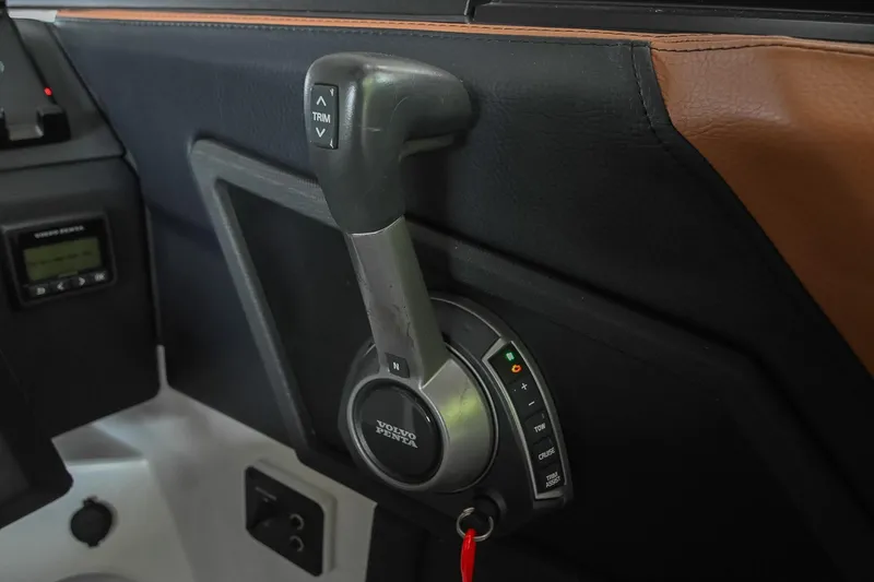 Slide: The Image of Throttle control panel of 2022 Cobalt R6 Surf boat with Volvo Penta system. - 31