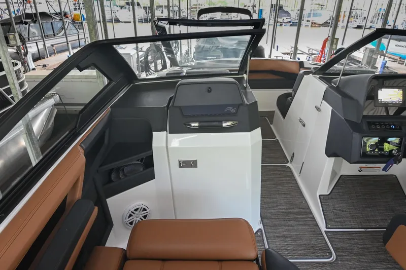 Slide: The Image of 2022 Cobalt R6 Surf boat interior with modern dashboard and seating. - 34