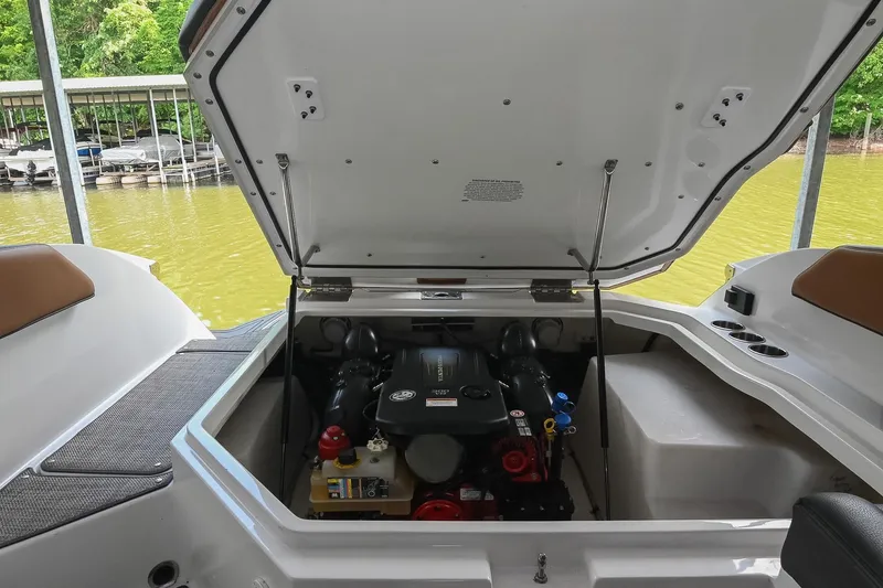 Slide: The Image of Open engine compartment of 2022 Cobalt R6 Surf boat at dockside. - 44